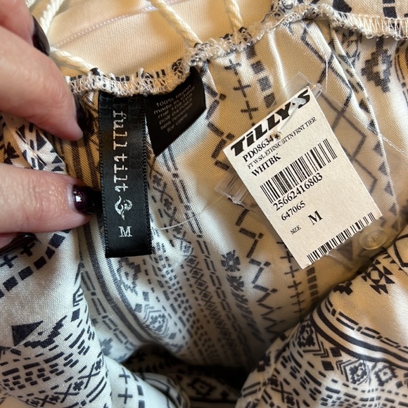 Dress with adjustable straps that tie in back - Picture 6 of 6